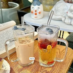 Transparent Glass juice, water, coffee straw cup with handle.